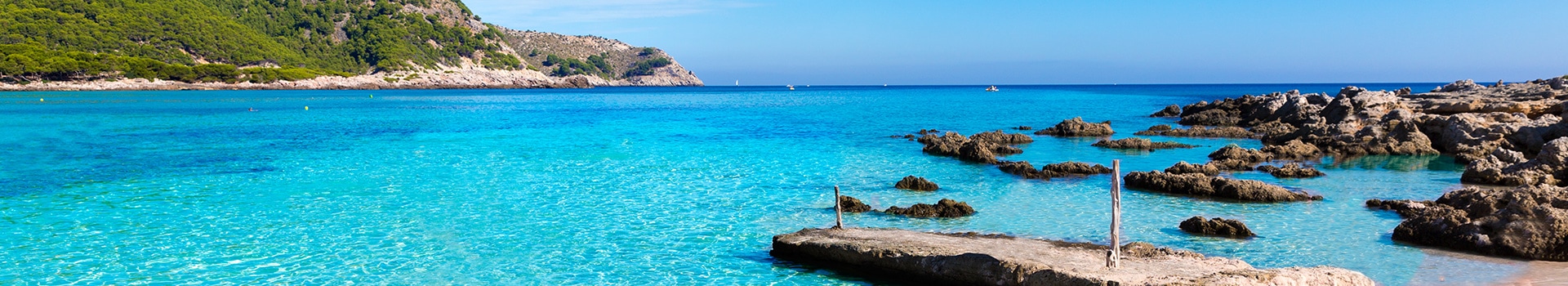 Viajes a **Cala Agulla**