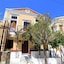 Symi Center